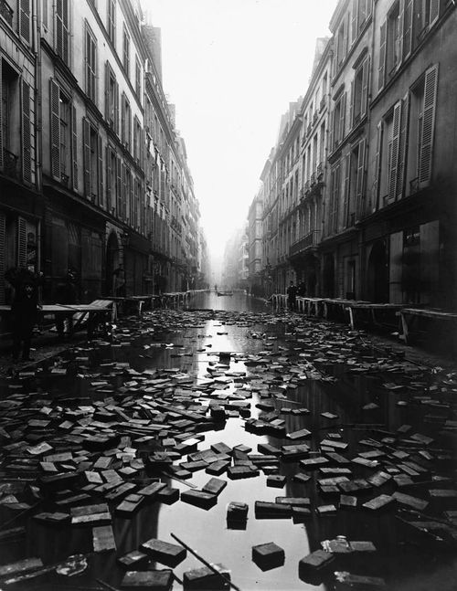 Via Book Mania!: "Books float on the street after a library on Rue Jacob, Paris is flooded during the Great 1910 Parisian Flood"